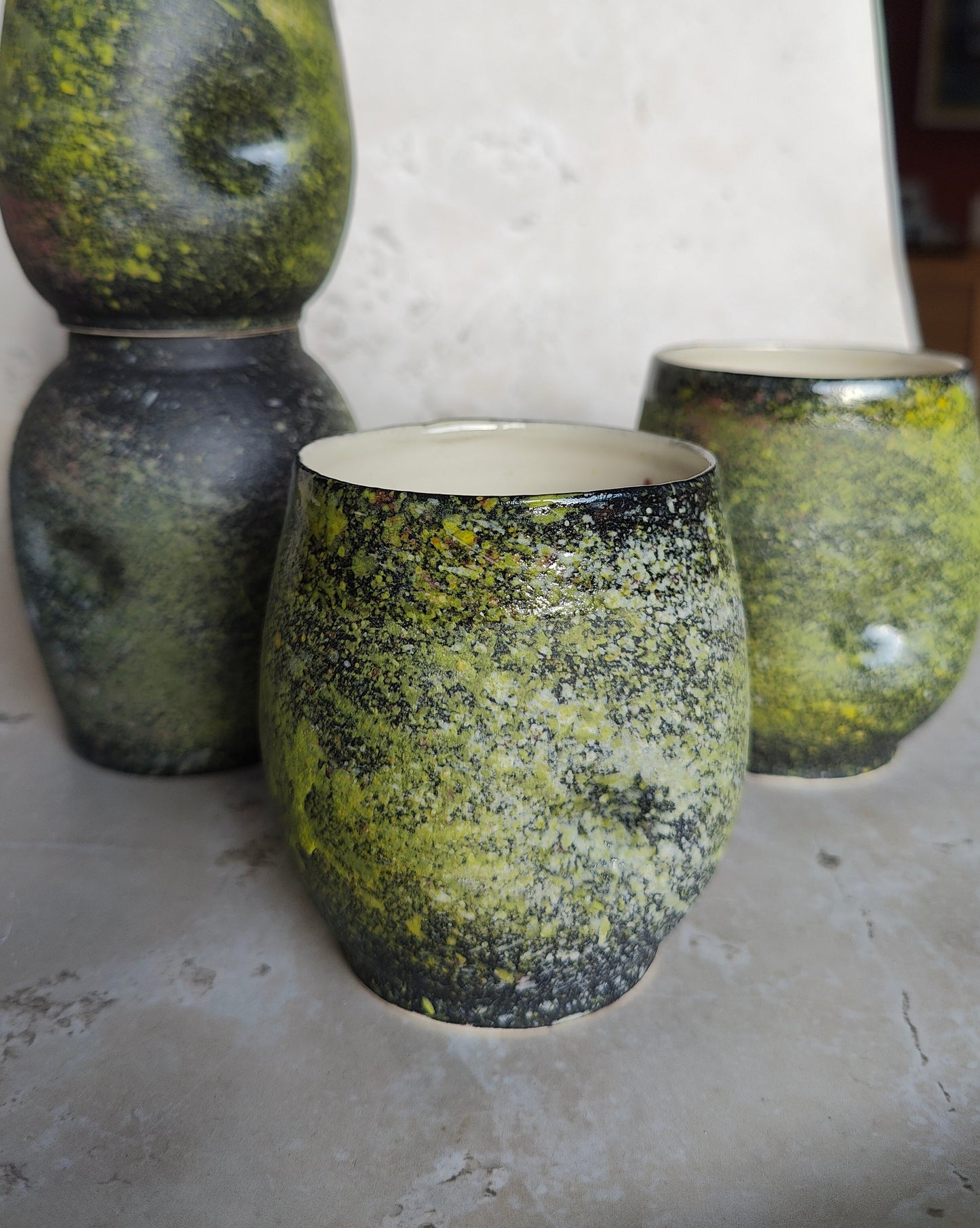 Moss-covered cup