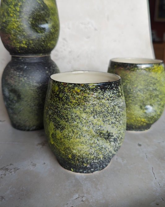 Moss-covered cup